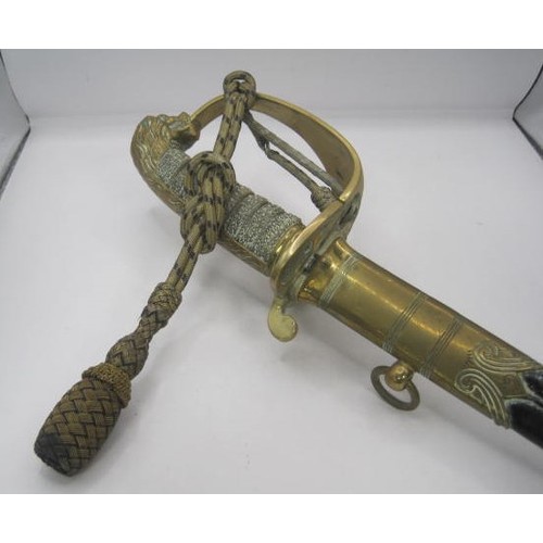 241 - An antique Royal Naval Volunteers officer's sword with scabbard and knot. Scarce Royal Naval Volunte... 