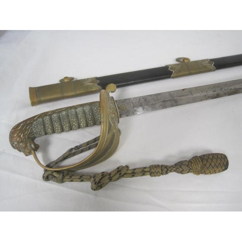 241 - An antique Royal Naval Volunteers officer's sword with scabbard and knot. Scarce Royal Naval Volunte... 