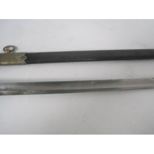 241 - An antique Royal Naval Volunteers officer's sword with scabbard and knot. Scarce Royal Naval Volunte... 