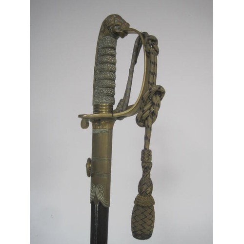 241 - An antique Royal Naval Volunteers officer's sword with scabbard and knot. Scarce Royal Naval Volunte... 