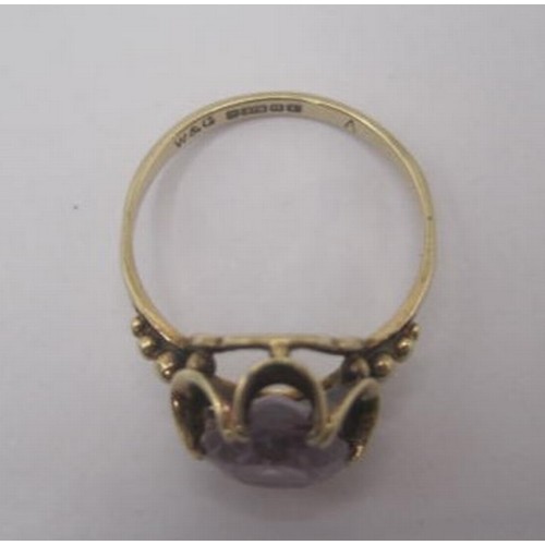 259 - A 9 carat gold amethyst ring, the oval amethyst estimated at 10.5mm x 8.5mm, in a looped claw settin... 