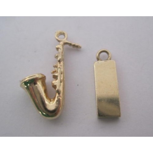 272 - Two 9 carat gold charms - a saxophone (approx. 1.6g) and an ingot (approx. 1.4g). Both with British ... 