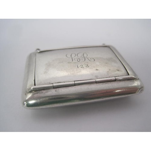 274 - A silver snuff box of oblong shape, the hinged lid engraved with initials and numbers 1 2 3, hallmar... 