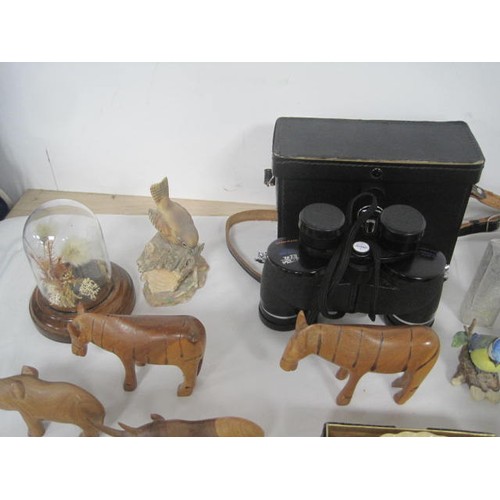 25 - A box of miscellaneous items including travel alarm clocks, pair of Swift 8 x 35 binoculars in case,... 