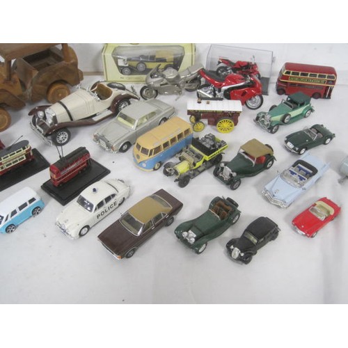 4 - A tray of die cast model cars and motorcycles, including Matchbox, Corgi, and a wooden Jeep