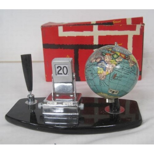 24 - A vintage pen or desk stand with perpetual calendar and globe marked Made in Japan. With original bo... 