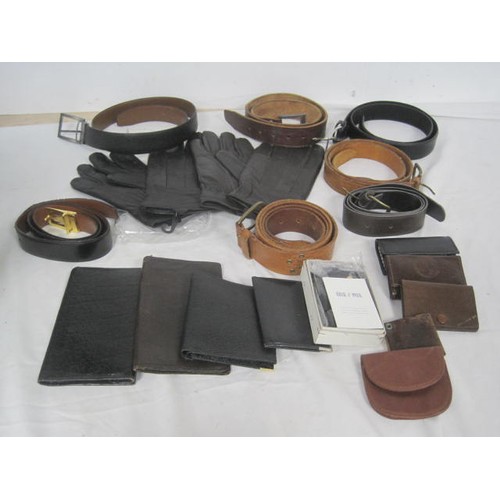 20 - An assortment of gents leather belts, wallets, key wallets and two pairs of gloves