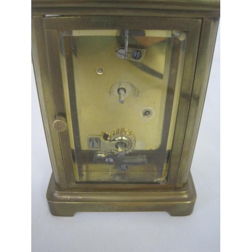 12 - A brass cased carriage clock, signed Mackay & Chisholm Edinburgh Made in France. Not seen running, a... 