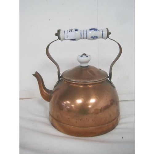 37 - A Tayee Taiwan copper kettle with blue and white china handle and knop, a vintage hammered copper ke... 