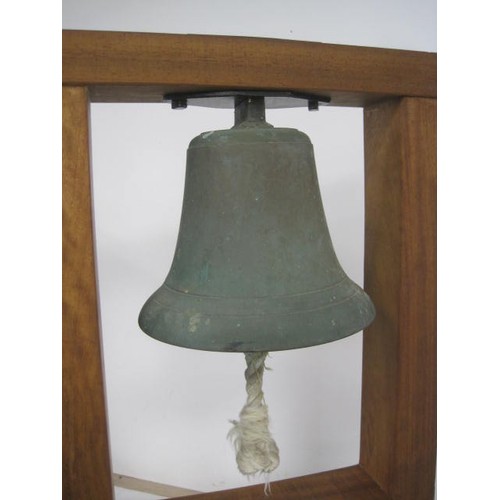 275 - RAF Scramble Bell. A bronze bell mounted on an iroko hardwood stand. With a brass plaque attached wh... 