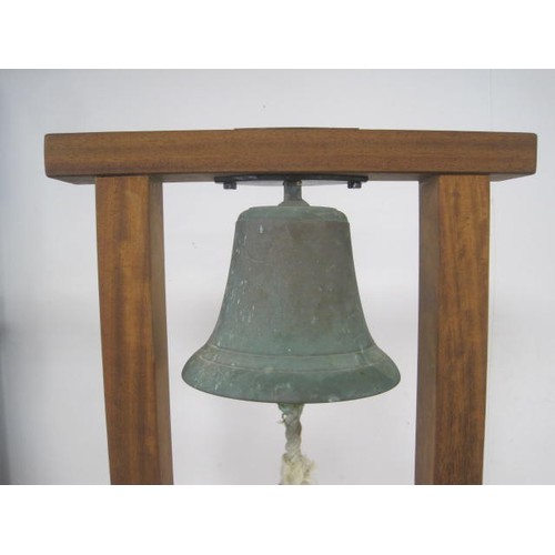 275 - RAF Scramble Bell. A bronze bell mounted on an iroko hardwood stand. With a brass plaque attached wh... 