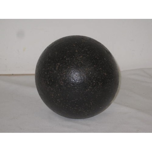 311 - A huge cast iron Cannon Ball weighing approximately 15kgs with an approximate diameter of 16cms.