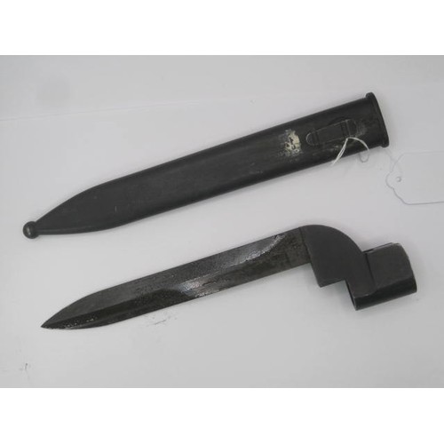 297 - A South Africa – ARMSCOR No.9 bayonet in its metal scabbard. Blade length 17cms.