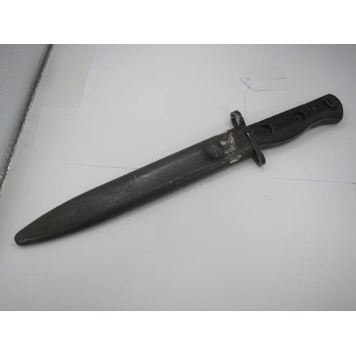 298 - A British L1A3 bayonet in its steel scabbard. Marked on the hilt L1A3 9600257 (NATO Stores No.). Bla... 