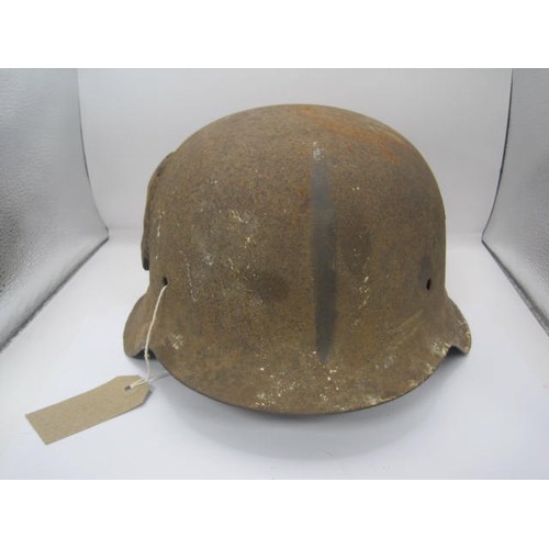 286 - A WW2 Third Reich M42 German helmet found at Carentan, France. Having a period repair on one side, v... 