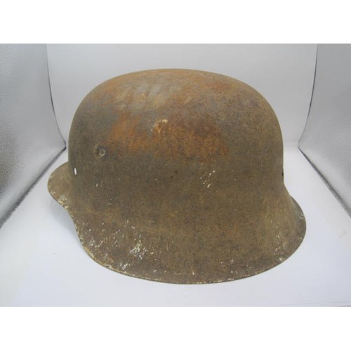 286 - A WW2 Third Reich M42 German helmet found at Carentan, France. Having a period repair on one side, v... 