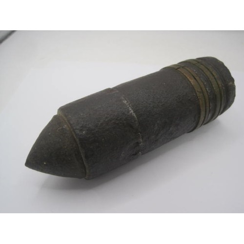 291 - An inert WW1 artillery shell head. Overall height 14.5cms by 4.5cms diameter with a weight of 1.65kg... 