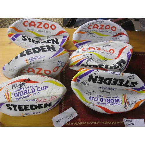 324 - A collection of 6 2021 Rugby League World Cup balls signed by various teams including Fiji Men's Tea... 