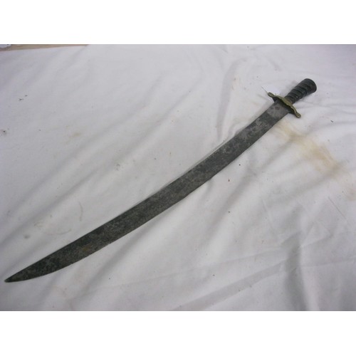 308 - 453 An 18th century Continental Hunting hangar sword with ebony handle and brass cross piece. Having... 