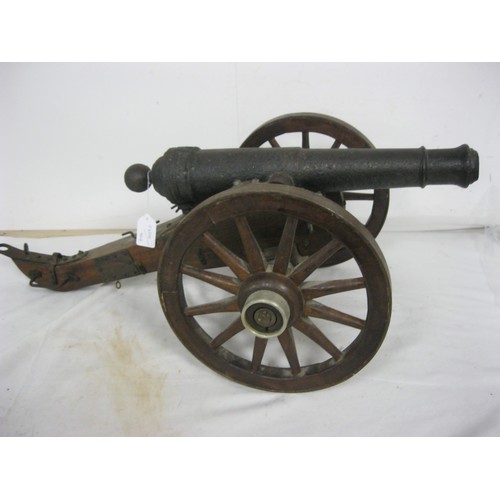 315 - 463 A 19th century Signal Cannon. Having a cast iron barrel 45cms long overall with an approximate b... 