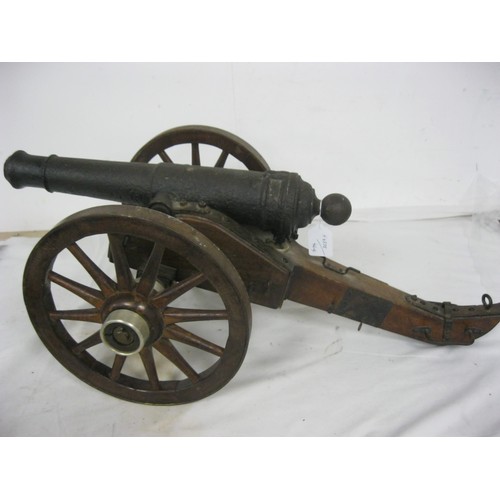 315 - 463 A 19th century Signal Cannon. Having a cast iron barrel 45cms long overall with an approximate b... 