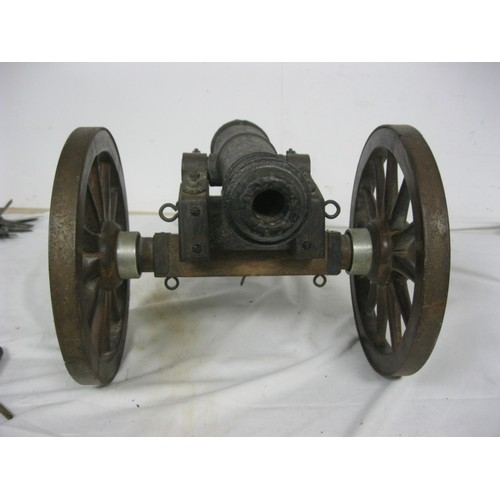 315 - 463 A 19th century Signal Cannon. Having a cast iron barrel 45cms long overall with an approximate b... 