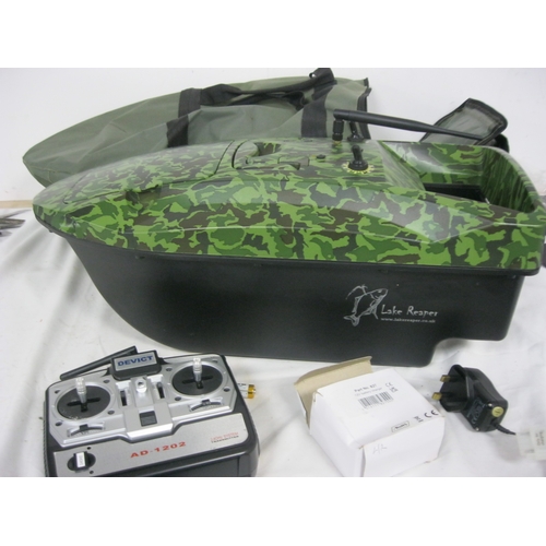 328 - A Lake Reaper Bait Boat, model AD1202, with carry case and radio control unit, in excellent - appare... 