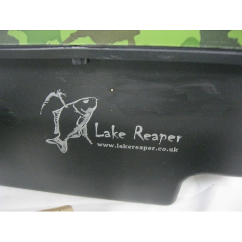 328 - A Lake Reaper Bait Boat, model AD1202, with carry case and radio control unit, in excellent - appare... 