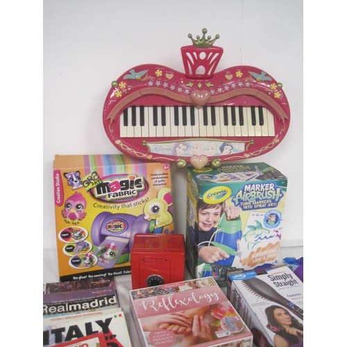 30 - A box of toys and general household items. Includes boxed Crayola airbrush, Disney Princess keyboard... 