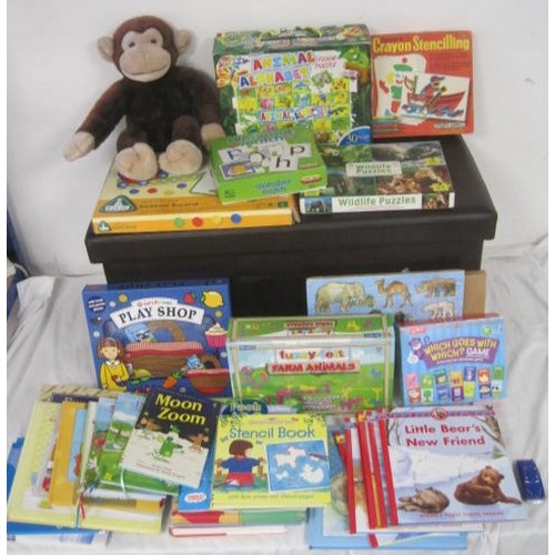 39 - A selection of boxed children's games and books, including fuzzy-felt, giant animal alphabet, crayon... 