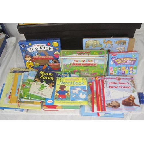 39 - A selection of boxed children's games and books, including fuzzy-felt, giant animal alphabet, crayon... 