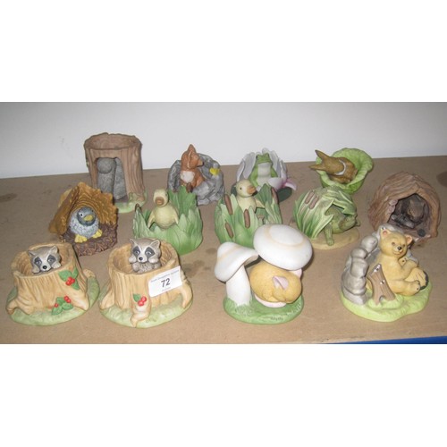 72 - Thirteen Franklin Porcelain Animals in realistic settings Frog in a lily, Raccoon in a tree stump et... 