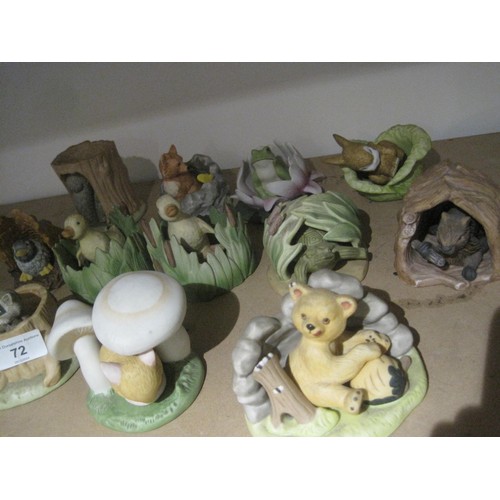 72 - Thirteen Franklin Porcelain Animals in realistic settings Frog in a lily, Raccoon in a tree stump et... 