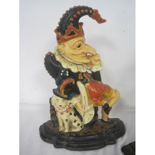 80 - A nice set of  Punch and Judy  metal doorstops approx 12 inches tall by a base plate width of 7 inch... 