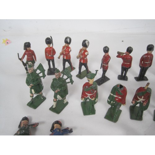 75 - A good selection of Lead soldiers including Yeoman of the guard ,Scottish Highlanders and British To... 