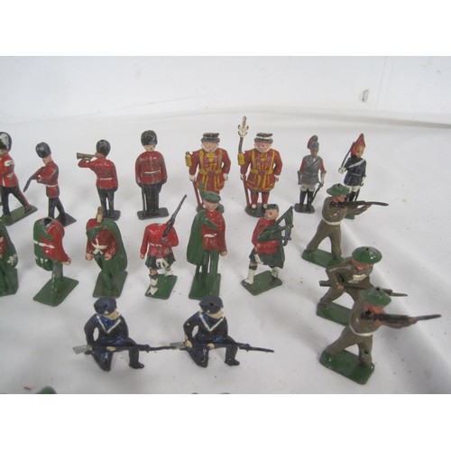 75 - A good selection of Lead soldiers including Yeoman of the guard ,Scottish Highlanders and British To... 