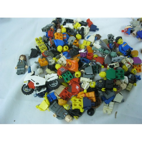 330 - Two bags containing an assortment of Lego figures and accessories for the same, all in apparent good... 