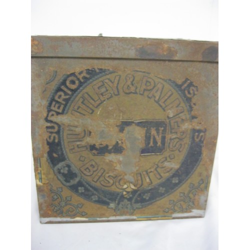 332 - A 1920s unopened tin of Huntley & Palmer's Biscuits, solder seals intact, paper labels deteriorated ... 