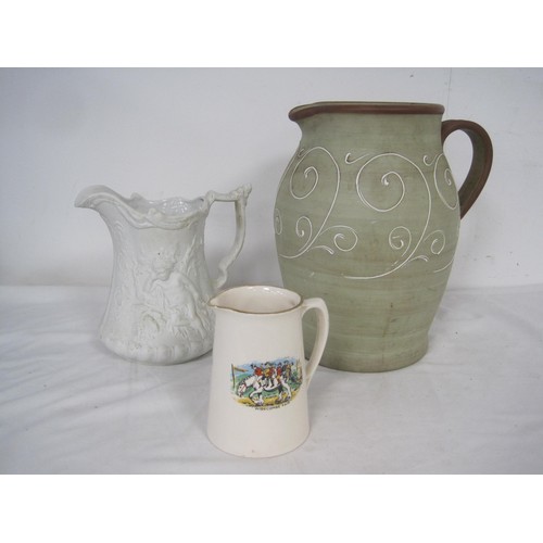 59 - Three Jugs including a very large Denby 1930s jug with tube lined decoration 14 inches. A Parian war... 