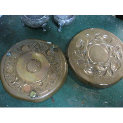 202 - A pair of arts & crafts style copper dishes, one footed but missing one foot, and a pair of pewter s... 