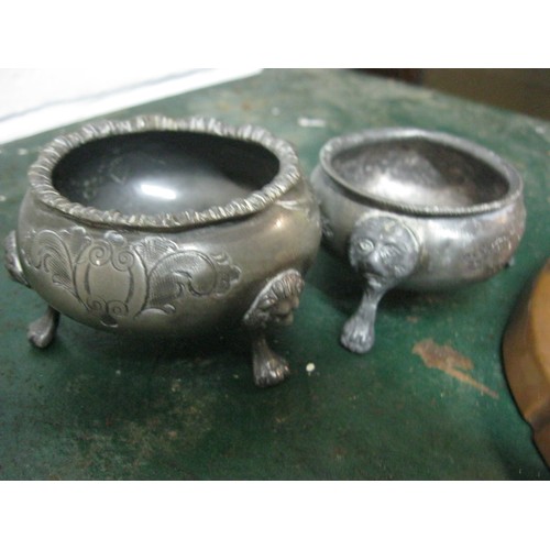 202 - A pair of arts & crafts style copper dishes, one footed but missing one foot, and a pair of pewter s... 