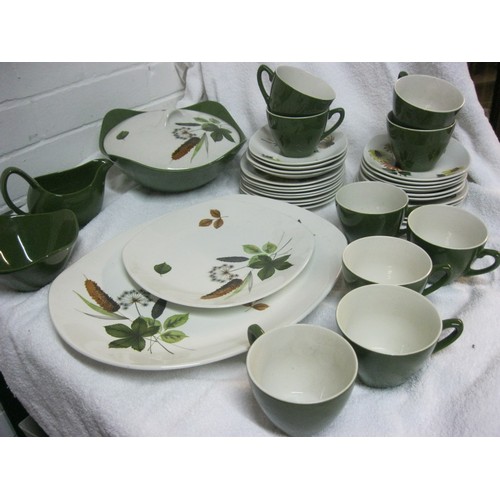 251 - A green and white midwinter tea service with side plates and serving plates (no teapot)