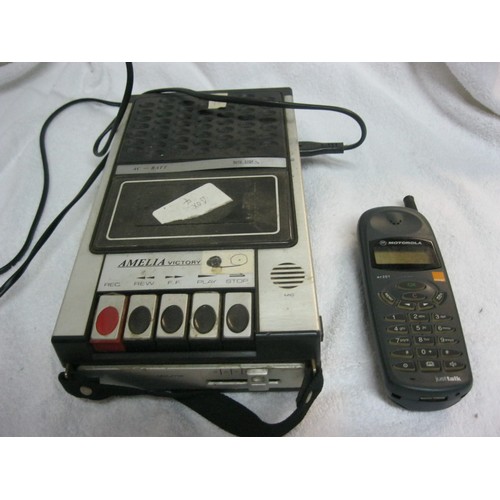 254 - A vintage Amelia Victory tape recorder with power cable and a large Motorola mobile phone