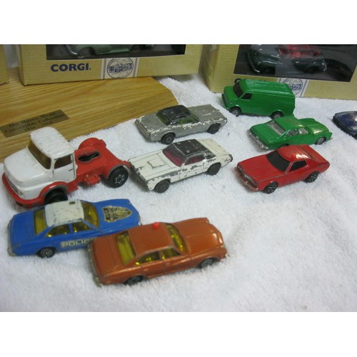 257 - Three boxed and unopened Corgi Classic Vehicles Morris Minor die cast cars plus a bag of playworn 19... 