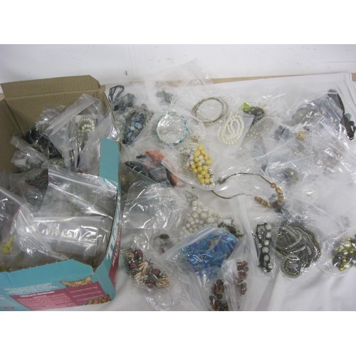 116 - A large box of assorted costume jewellery, individually bagged