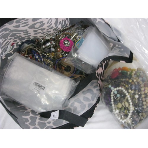 119 - A large bag of loose costume jewellery