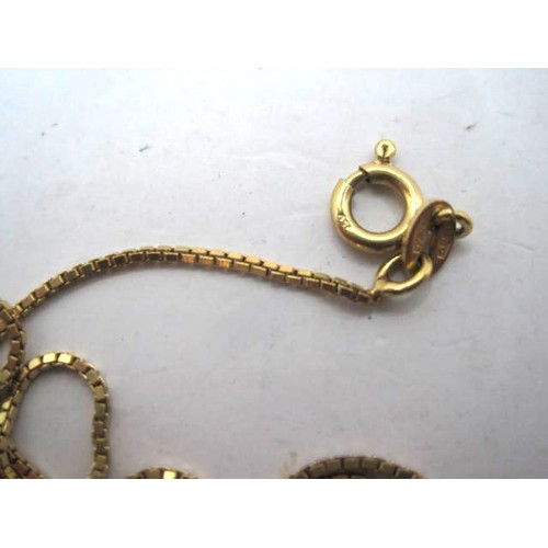 11 - An 18 carat gold chain, approx weight 3.4g, a shade over 15 1/2