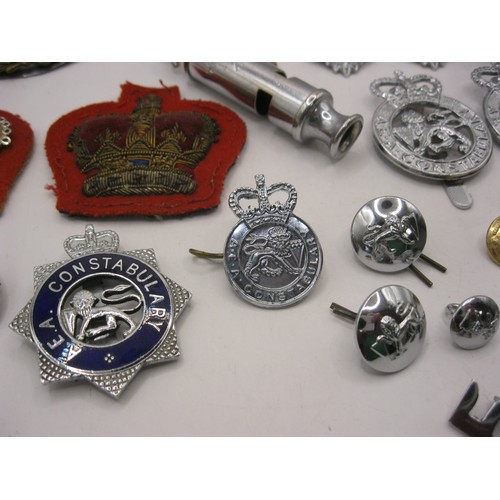 2 - A small cigar box full of police badges and buttons, the badges being for the AEA Constabulary, Insp... 