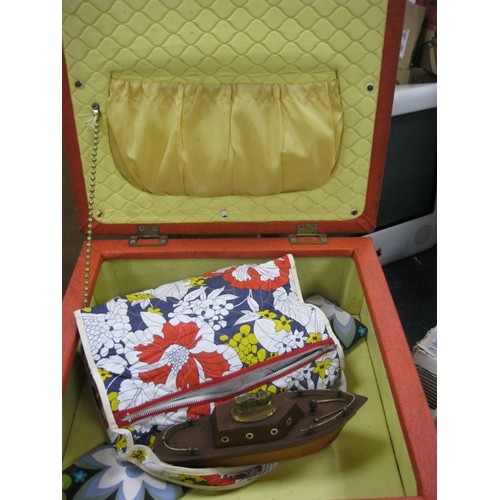 162 - A red 1960s freestanding sewing box with padded top, plus contents