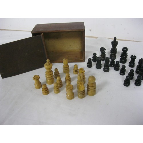 164 - A nicely turned set of wooden chess pieces in original box, all in good order